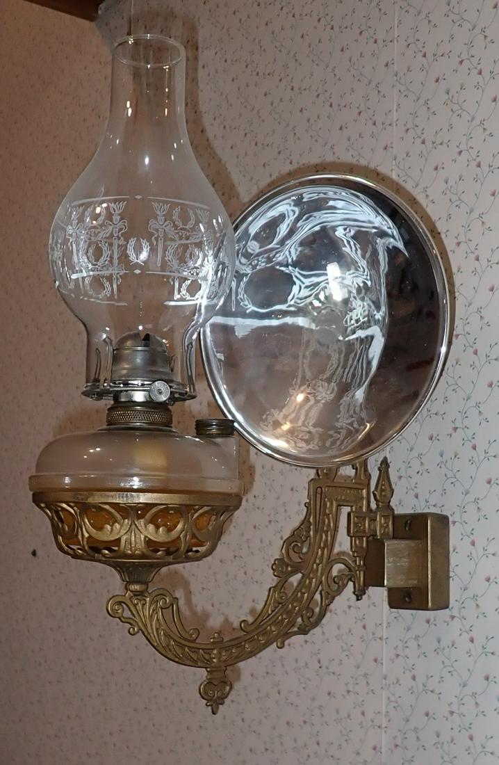 Oil Lamp w/ Wall Mount and Reflector: Buyer to bring phillips screwdriver to remove from wall.