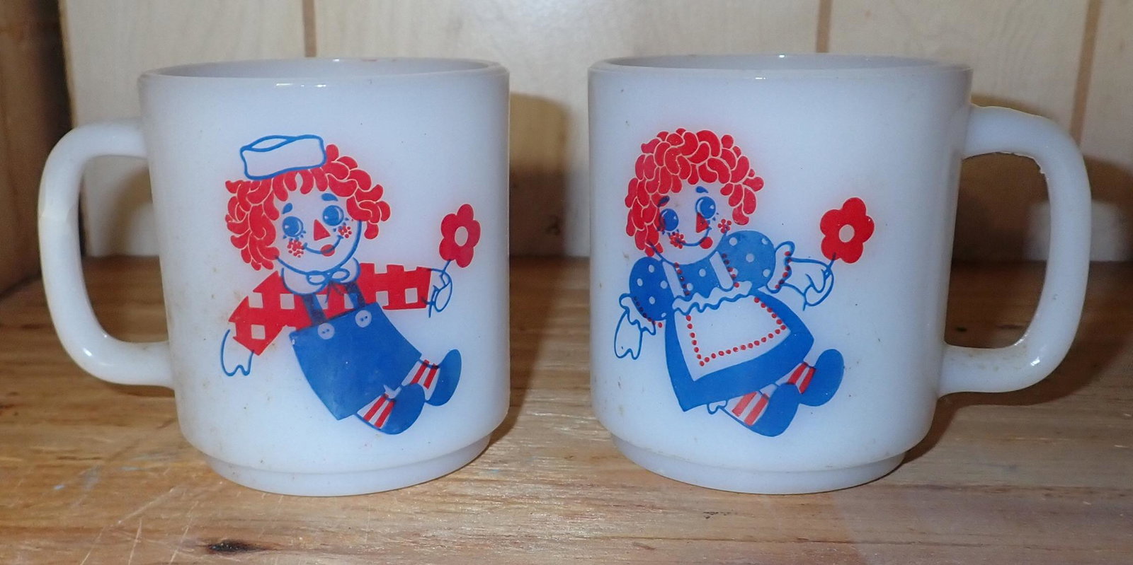 Raggedy Ann & Andy Mugs: Approx 3" in diameter and 3 1/2" tall