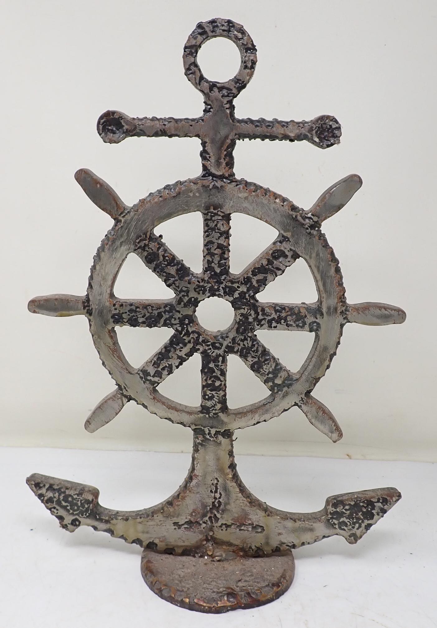 Nautical Ships Wheel Doorstop: Arts & Crafts stlye door stop is approx 10 1/2" x 15" tall. Made of steel
