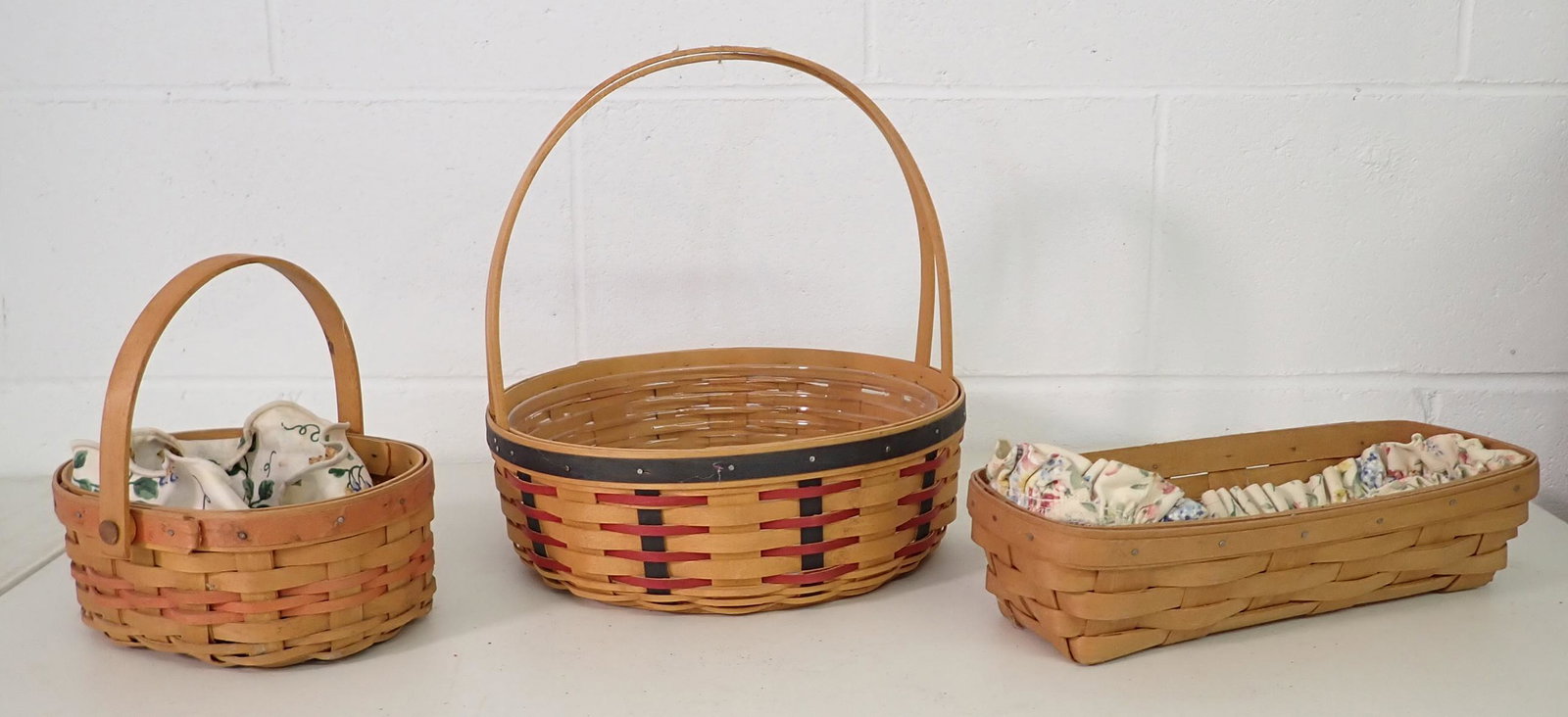 3 Longaberger Baskets: Largest is approx 10 3/8" in diameter and 11" to top of handle