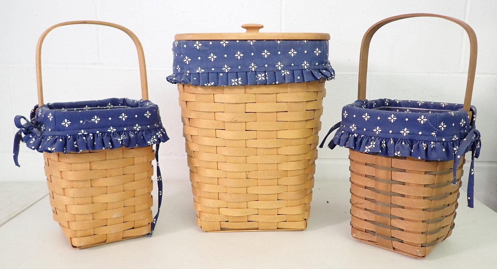 3 Longaberger Baskets: Largest is approx 9 1/2" x 10" x 13 1/2" tall. All have protectors and liners