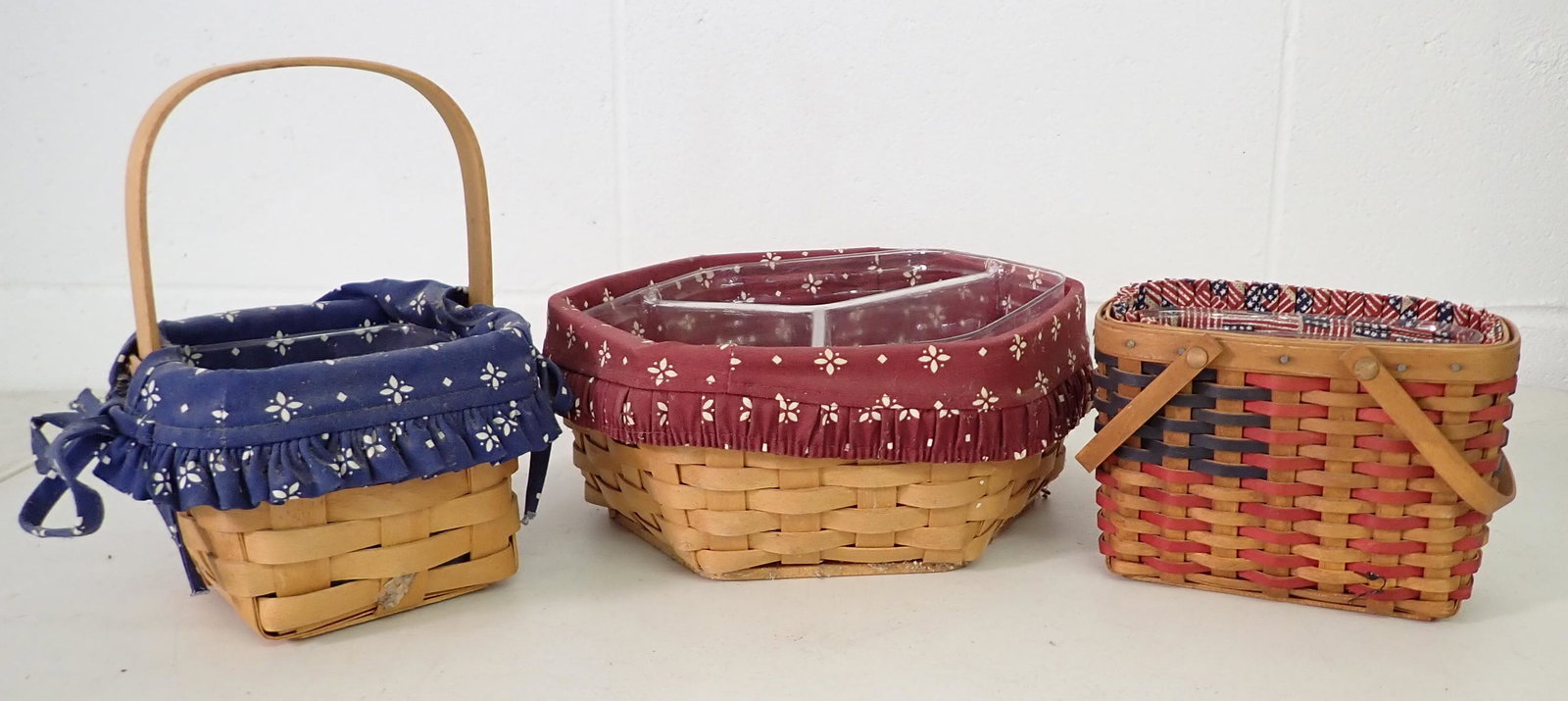 3 Longaberger Baskets: Largest is approx 9 1/4" x 9 1/2" x 4" tall. All have protectors and liners