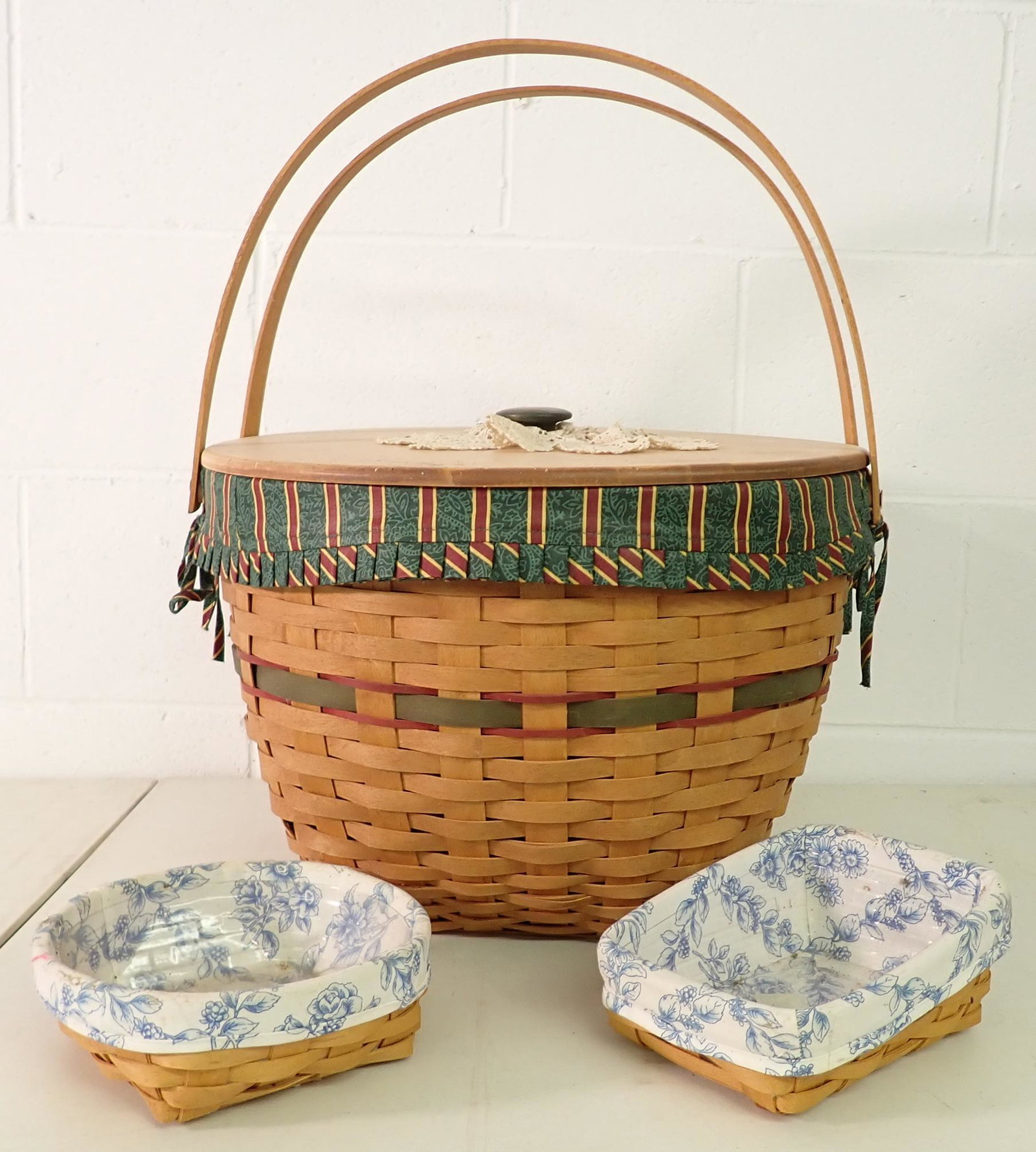 3 Longaberger Baskets: Largest is approx 16 1/2" in diameter and 12 1/2" tall. All have protectors and liners