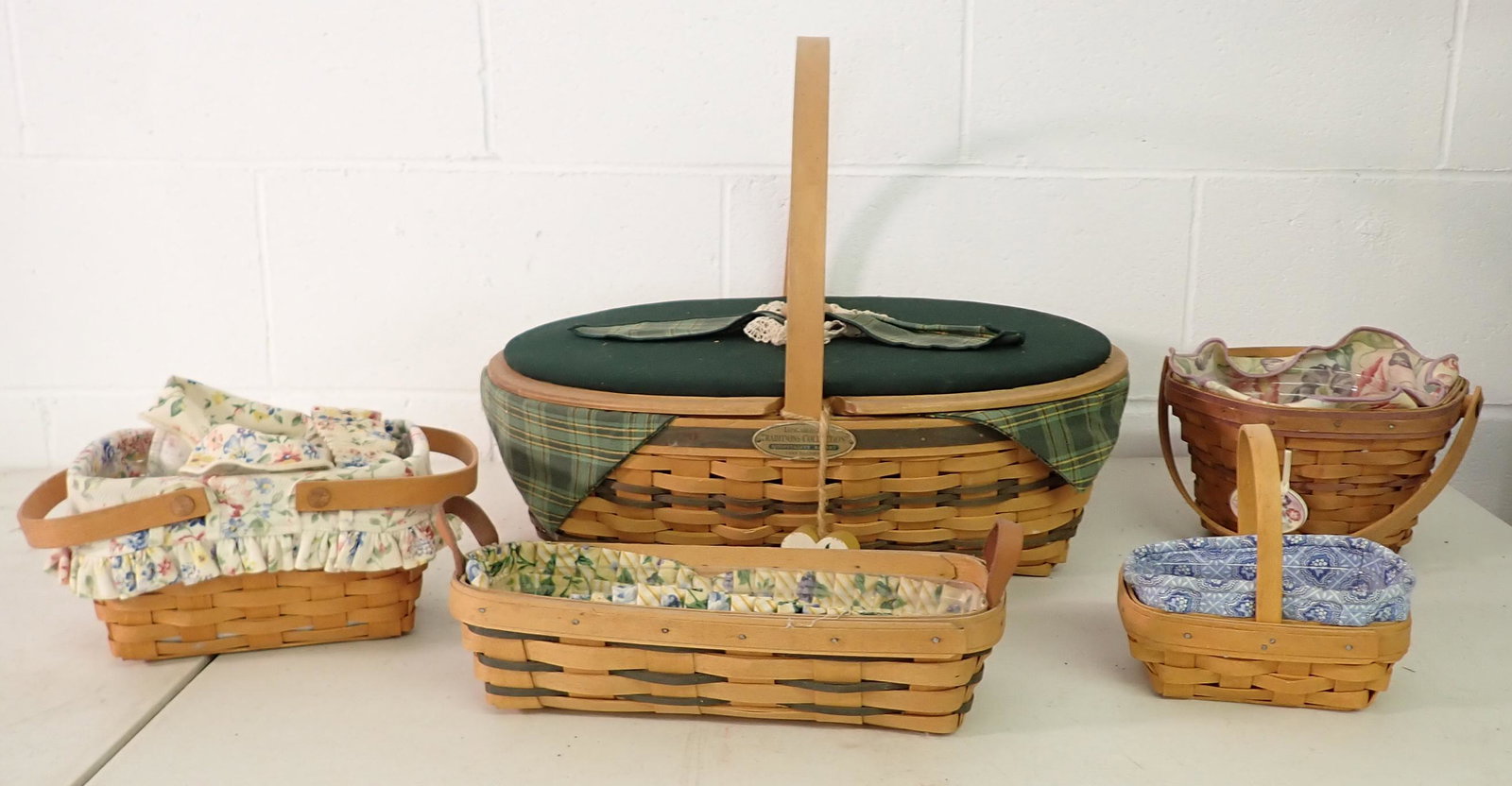5 Longaberger Baskets: Largest is approx 14" x 18 1/2" x 6" tall. All have protectors and liners