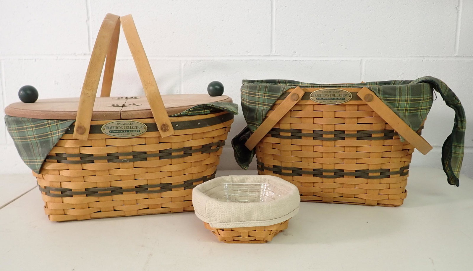 3 Longaberger Baskets: Largest is approx 13 1/4" x 15 1/4" x 7" tall. All have protectors and liners