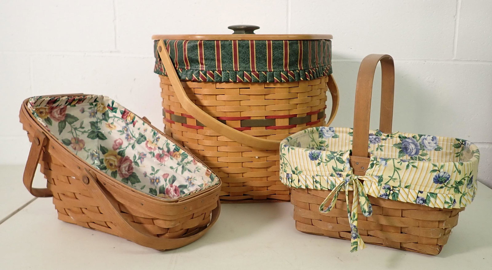 3 Longaberger Baskets: Largest is approx 14" x 13" x 12" tall. All have protectors and liners