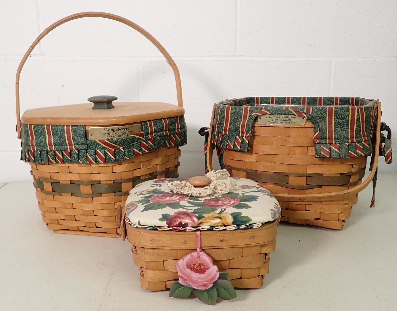 3 Longaberger Baskets: Back right one is apprx 8 3/8" x 9" x 7" tall. All have protectors and liners.