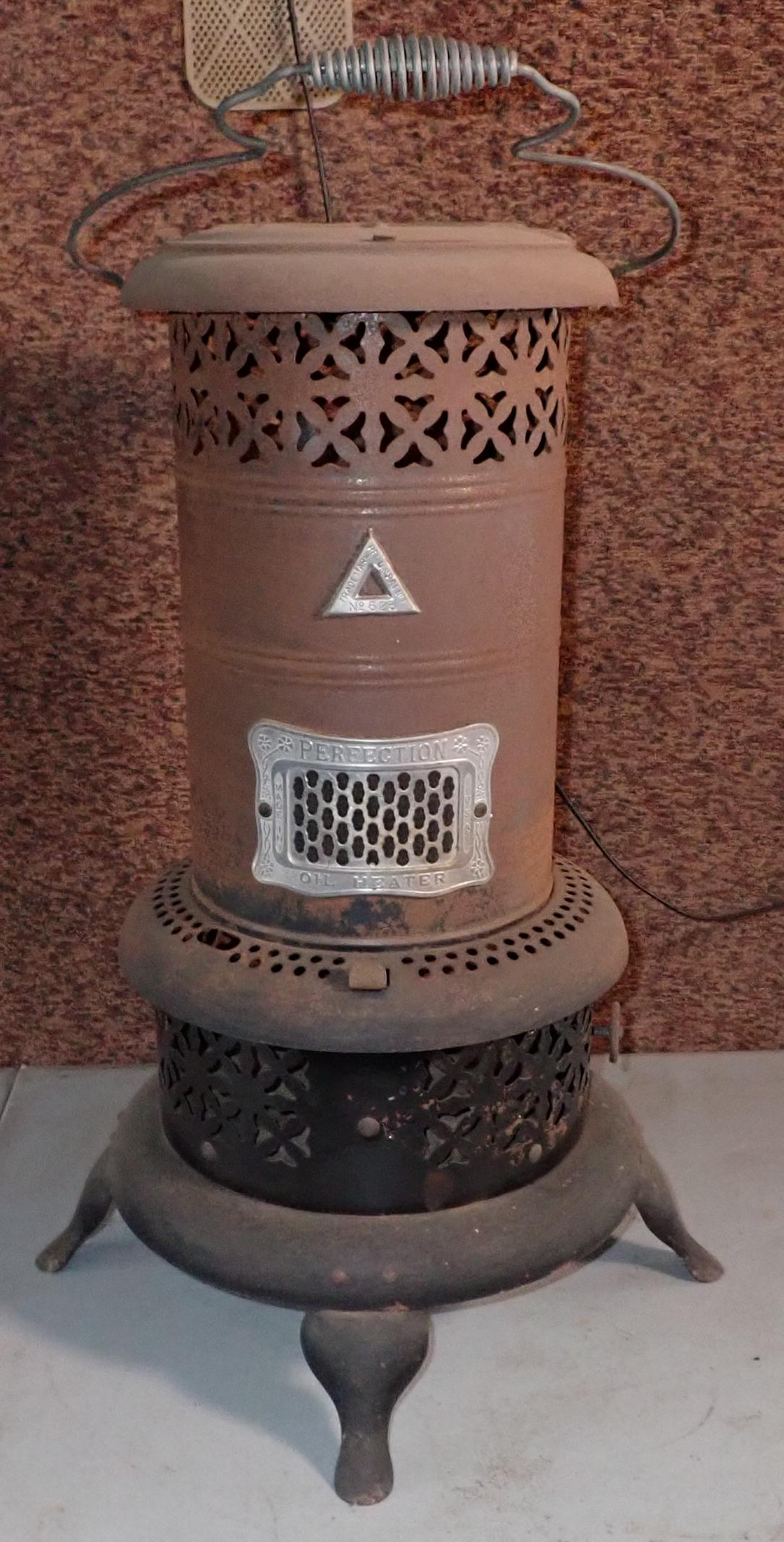 Perfection No. 525 Oil Heater: Approx 23 3/4" tall. No shipping