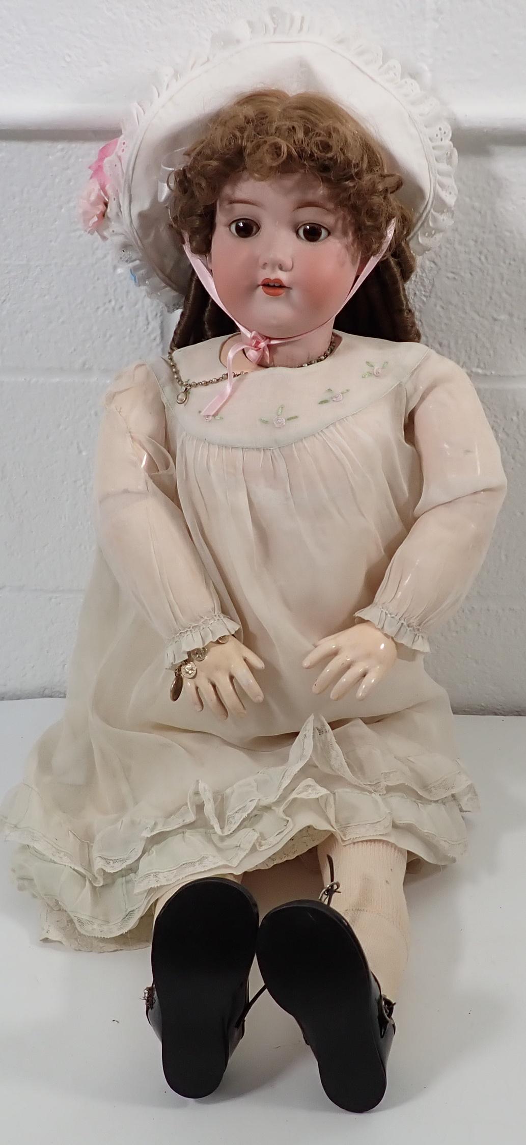 Armand Marseille 390 Bisque Head Doll: Sleepy eye, open mouth with Teeth doll is approx 30". If shipping is needed, this is something we would have the local UPS Store pack and ship. It is recommended to call/email them to get a quote befo