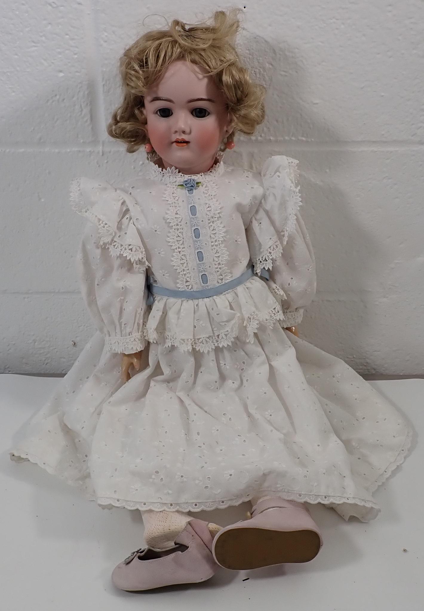 Handerwerck 5 1/2 German Bisque Head Doll: Doll is approx 28". Has sleepy eyes, open mouth with teeth.