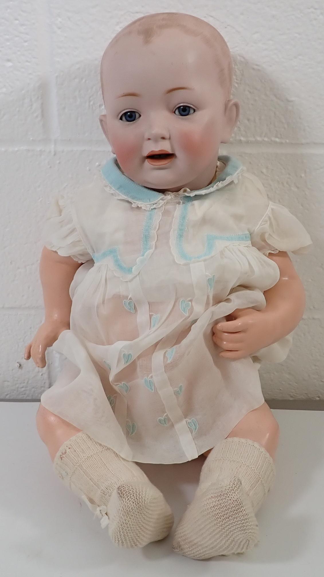 JDK German Bisque Head Baby Doll: Approx 24". Sleepy eye, open mouth with 2 teeth. Composition body