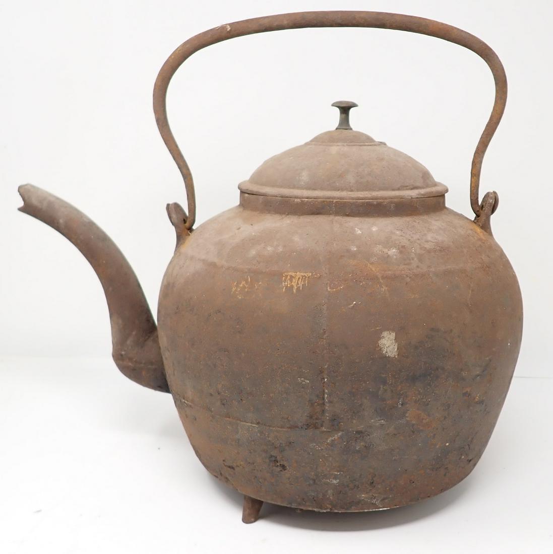 Cast Iron Footed Teapot: Approx 9 1/2" in diameter and 11 1/4" tall.