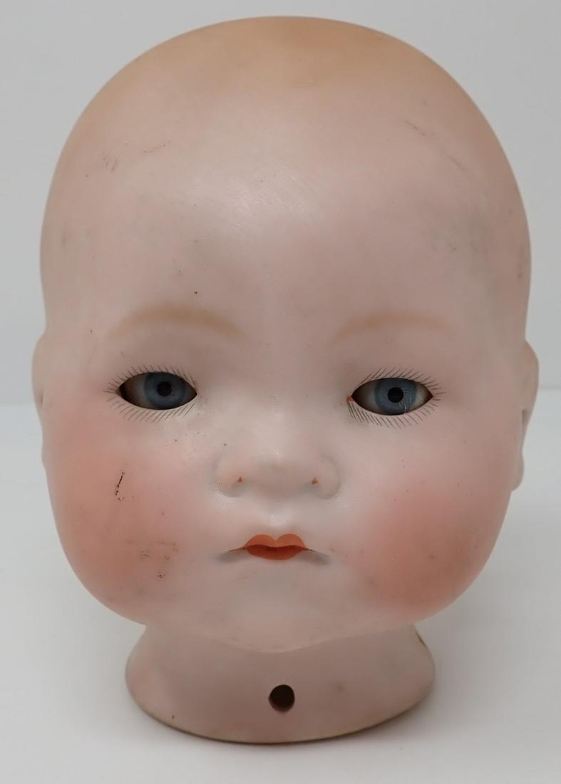 Armand Marseille 341 Bisque Baby Head Doll: Marked 3 1/2 . Approx 4 1/2" tall.
