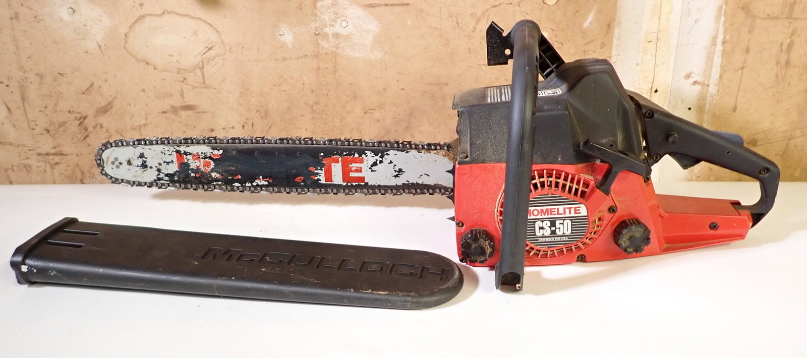 Homelite CS-50 Chainsaw: Has apprx 20" bar. NO SHIPPING
