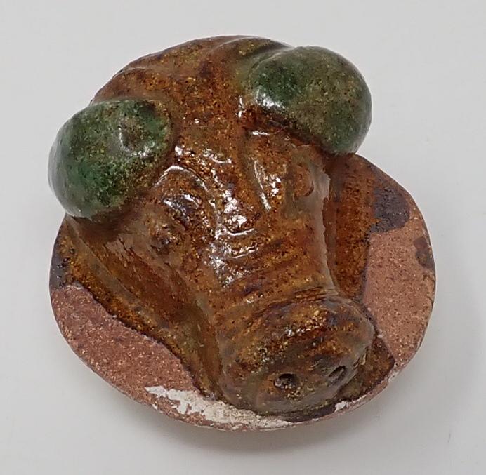 Chinese Tomb Offering Pig Head: Ancient Chinese Tomb offering figure. Paper with it reads - Late Ming Dynasty c 1600A.D. , left at tomb as offering to ancestor spirit. Approx 2 3/4" in diameter and 2" tall