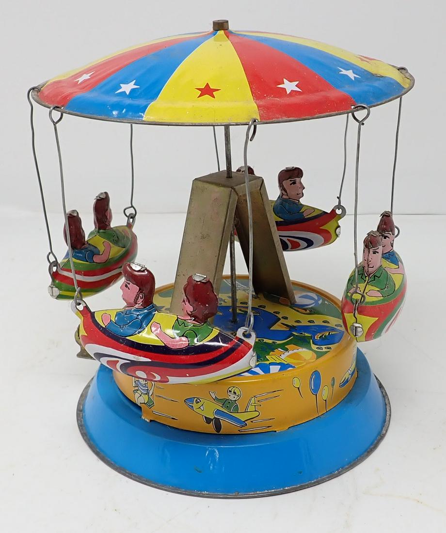 Vintage Tin Merry Go Round Toy (1 of 3)