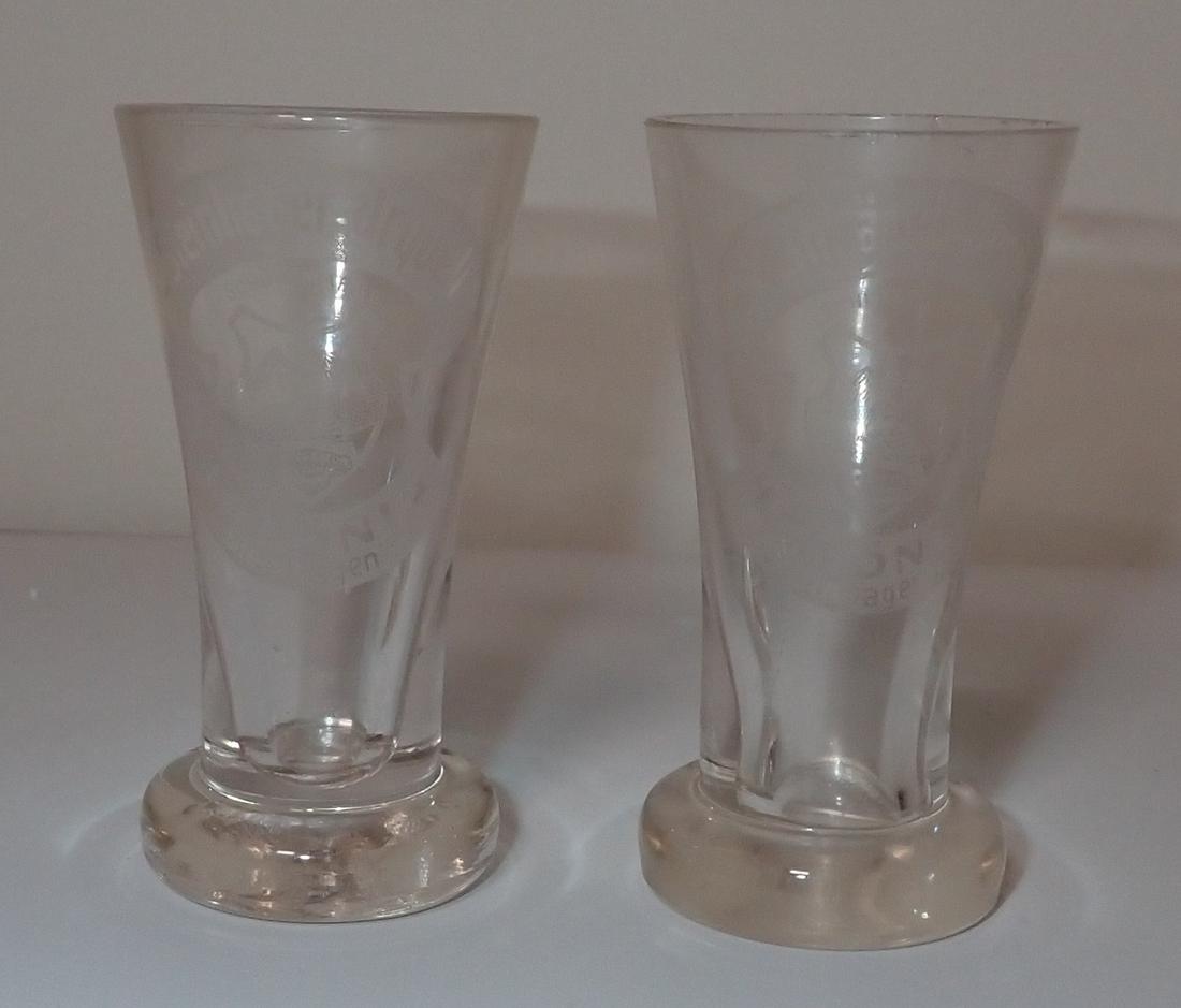 Steinhager Urquell H.C Konig Shot Glasses: Etched shot glasses are apprx 1 3/8" in diameter and 2 5/8" tall.