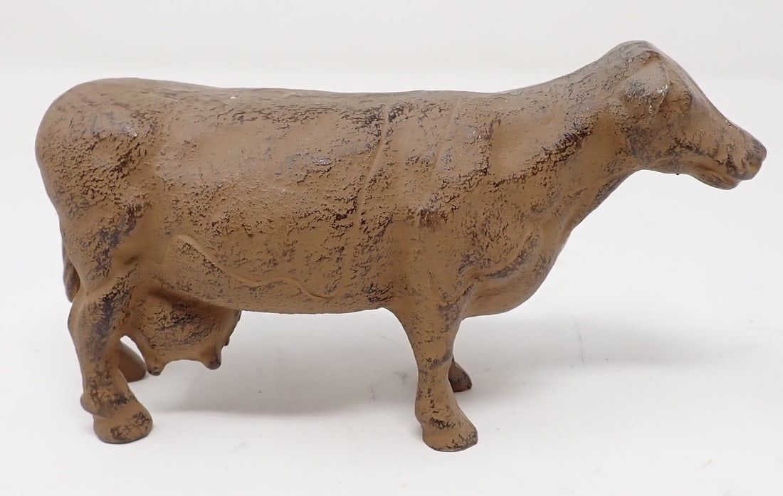 Cast Iron Cow: Approx 6 1/4" long and 3 5/8" tall
