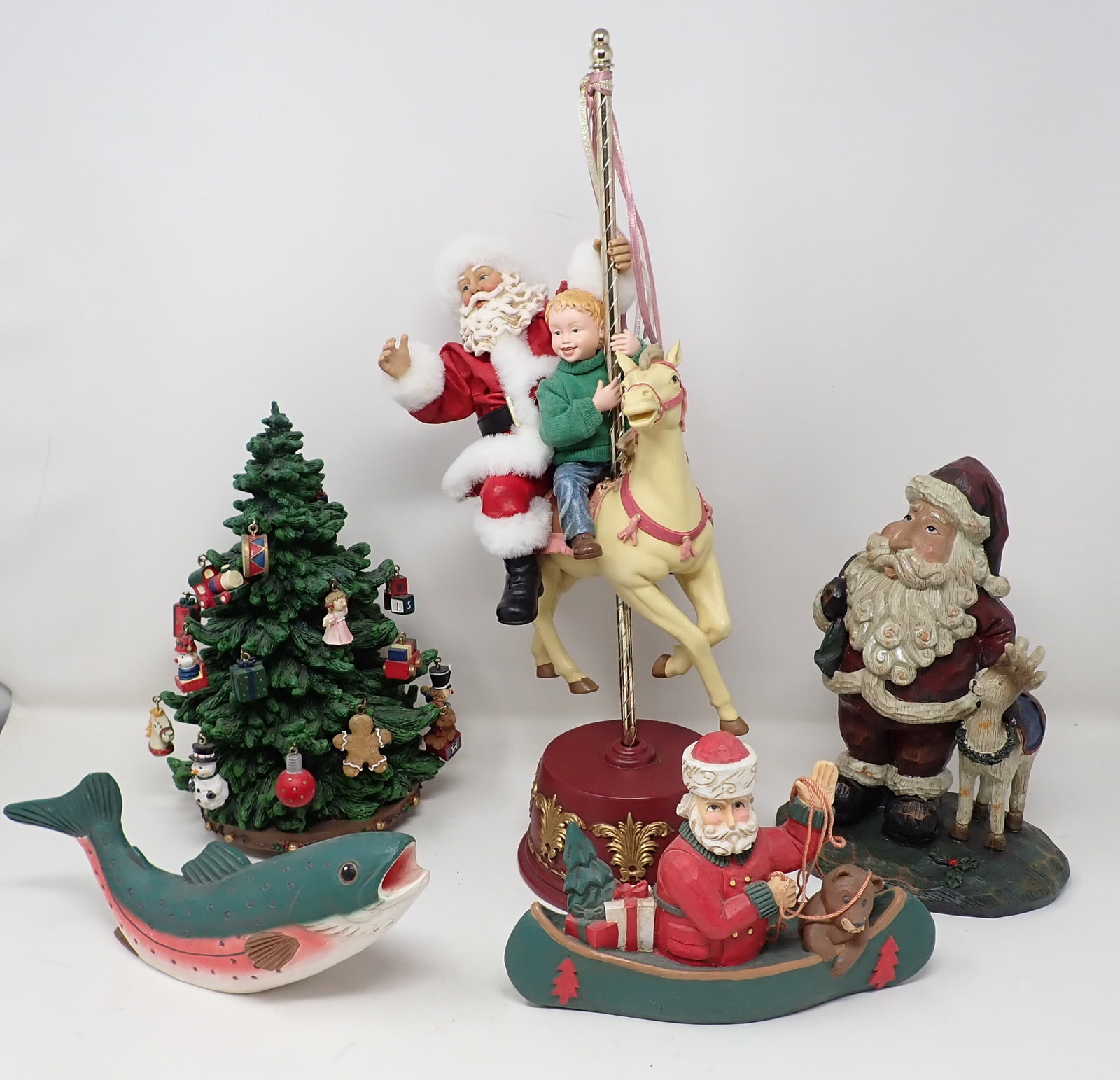 Christmas Figurines & Musical Carousel: Musical Carousel in center is approx 17" tall. NO SHIPPING