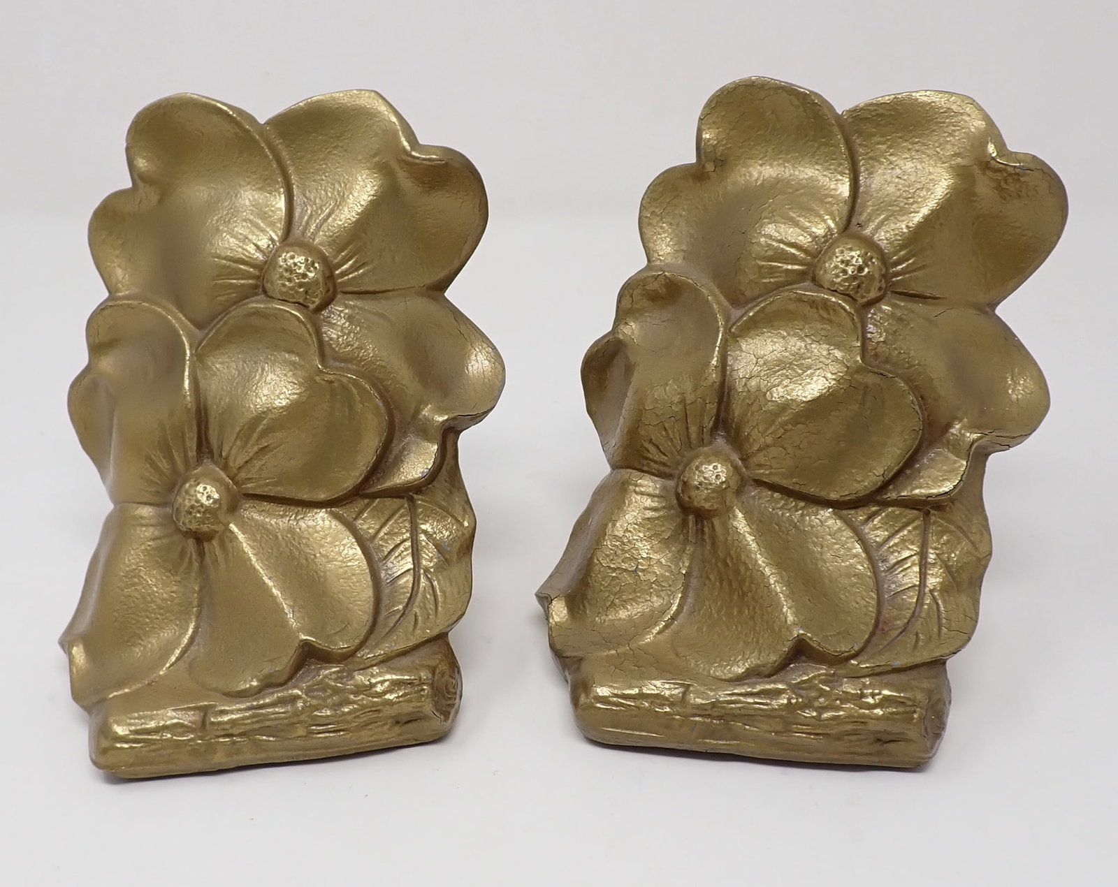 Floral Bookends: Possibly cast Iron. Approx 4 1/2" x 5 1/2" tall