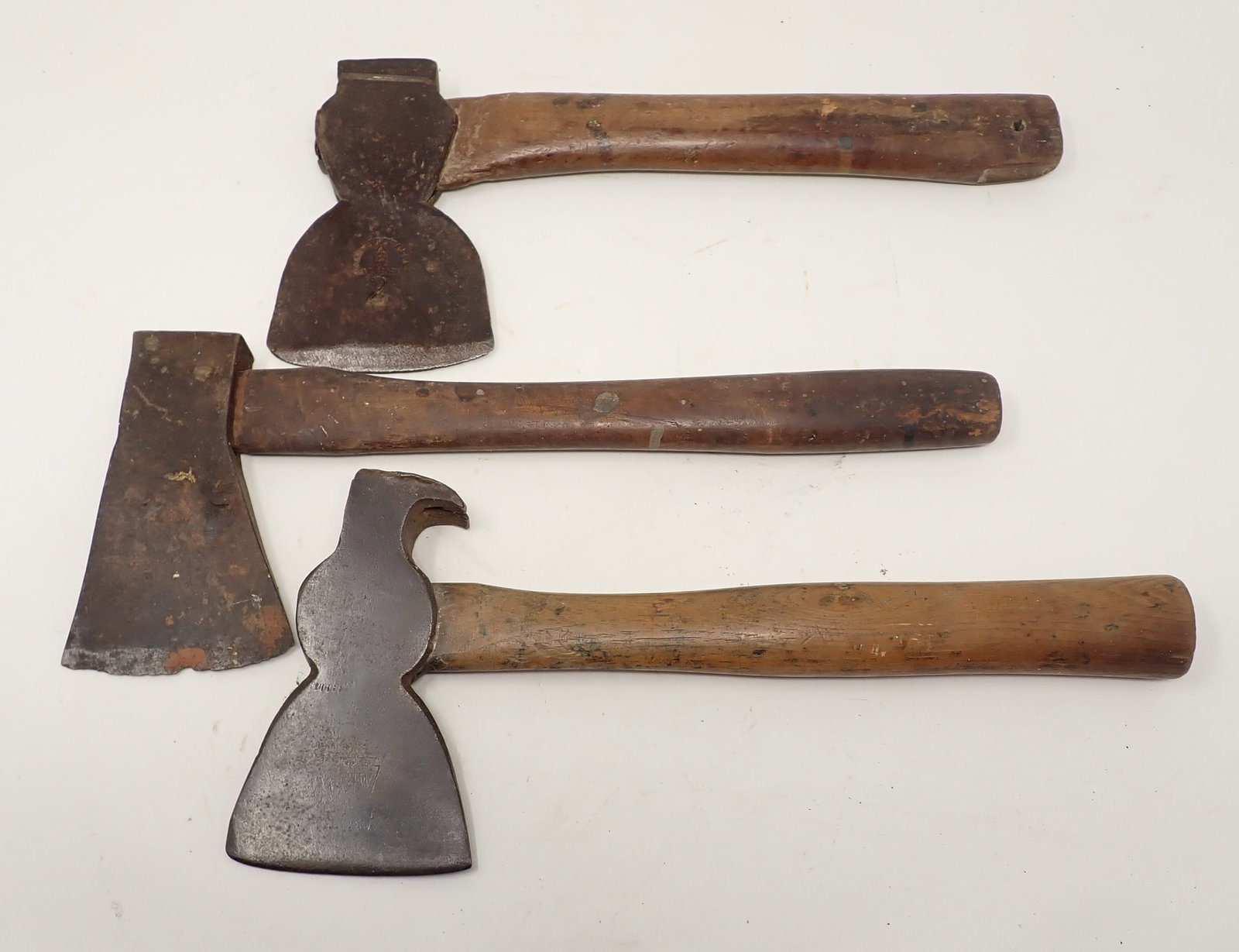 James Howarth Griffith Hachets / Axes: Middle one is not marked and is 14" long.