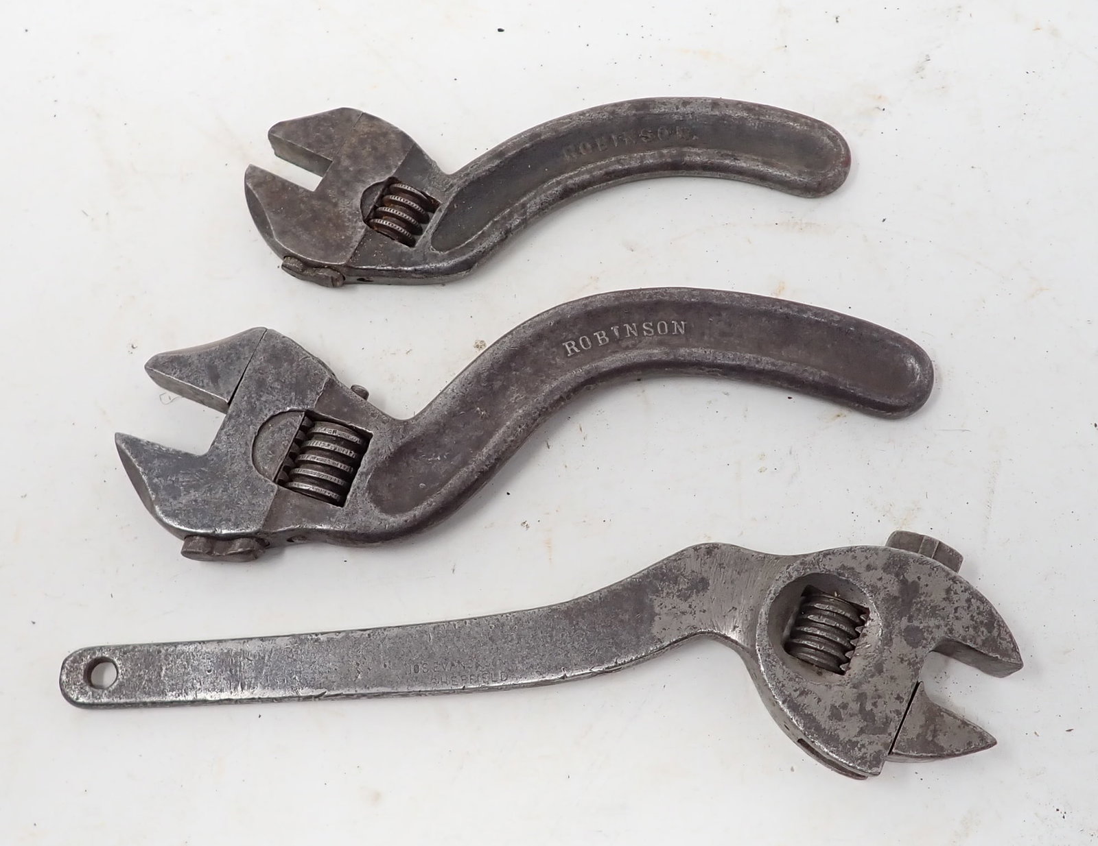 Adjustable "S" Wrenches Robinson: 2 In back are Robinson. Can not make out the one in the front. Longest is approx 8 1/2"
