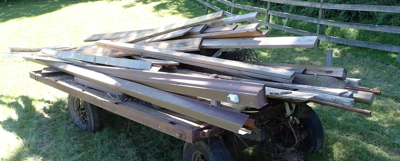 Lumber Aluminum & Scrap Iron: Lot includes all pictured on wagon. Must take all, have removed before 1pm on first pick up day. You will need a 4x4 truck. No shipping