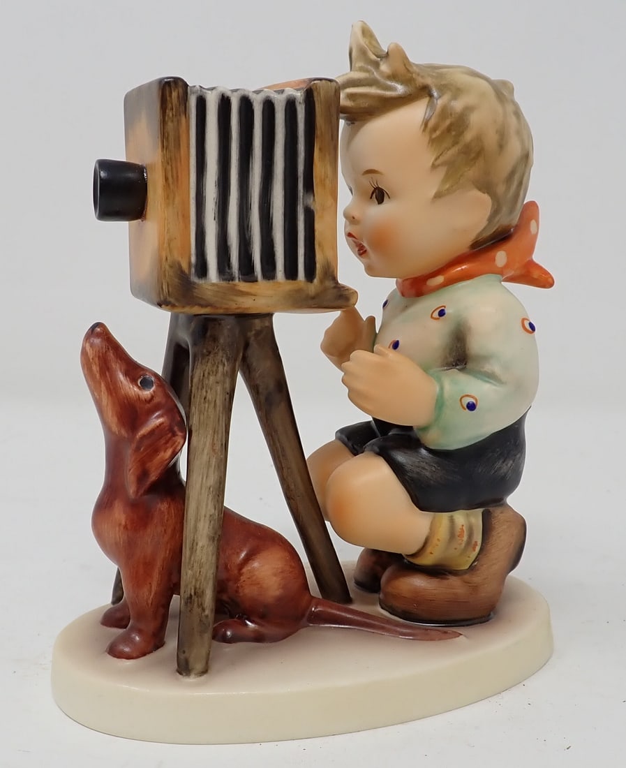 Hummel Boy with Camera and Dog (1 of 2)