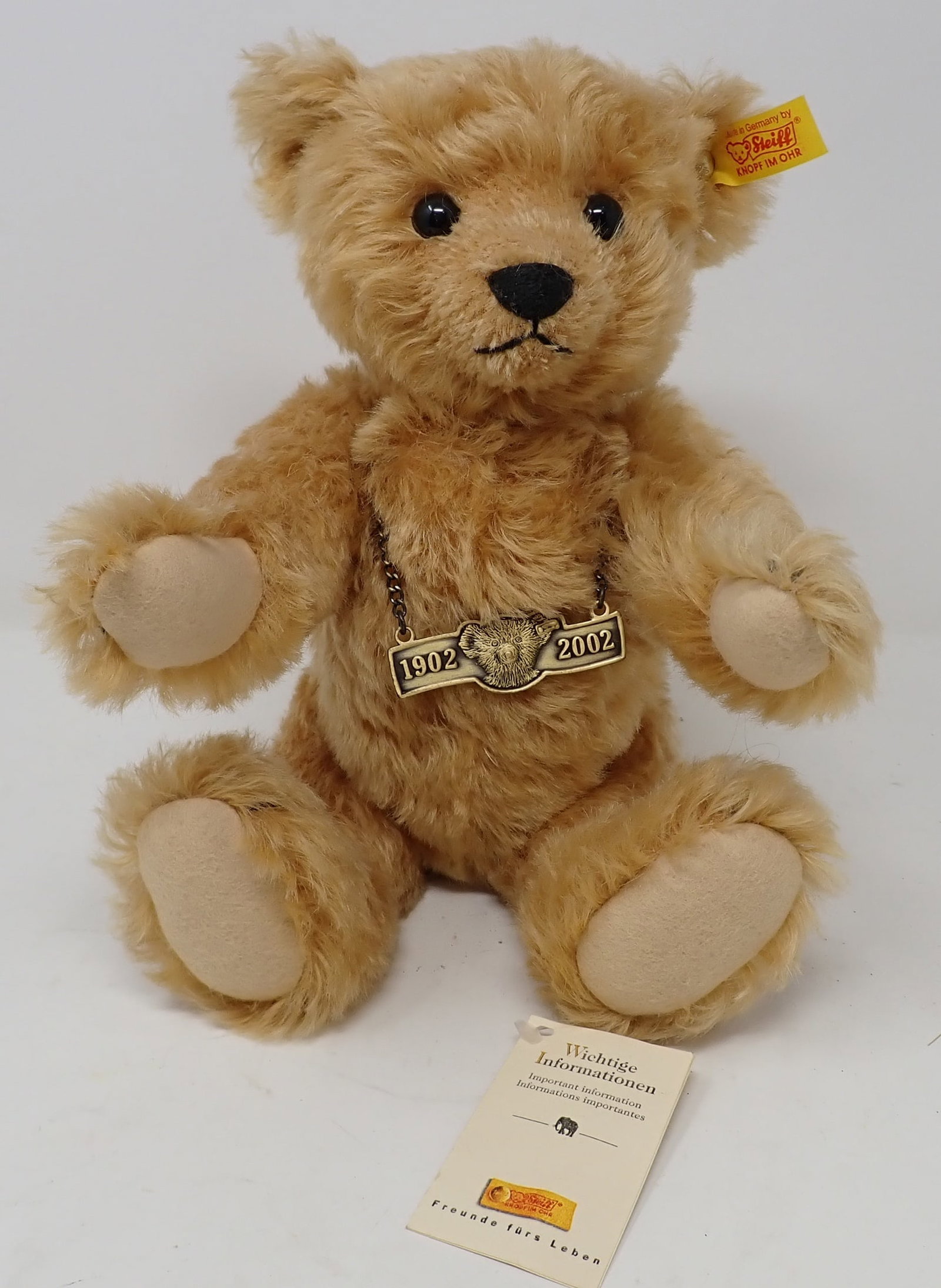 Steiff Teddy Bear: Jointed bear with noisemaker is approx 9" tall