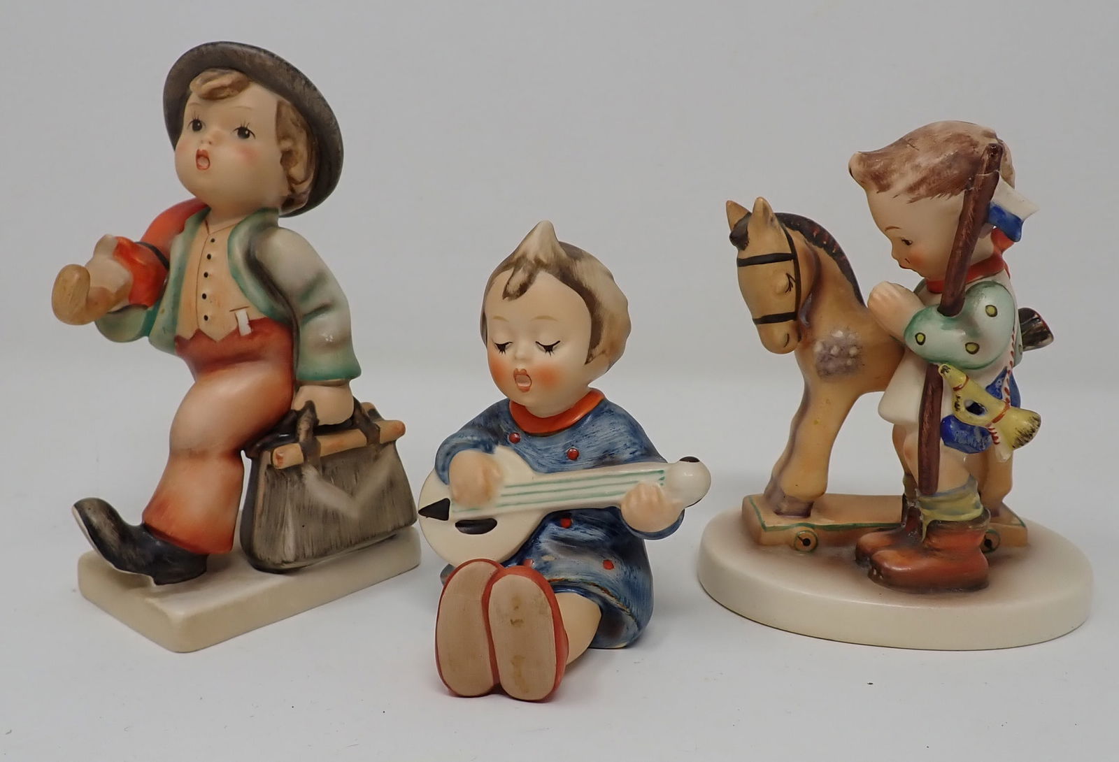 3 Goebel Hummels: Tallest is apprx 4 1/2" tall.