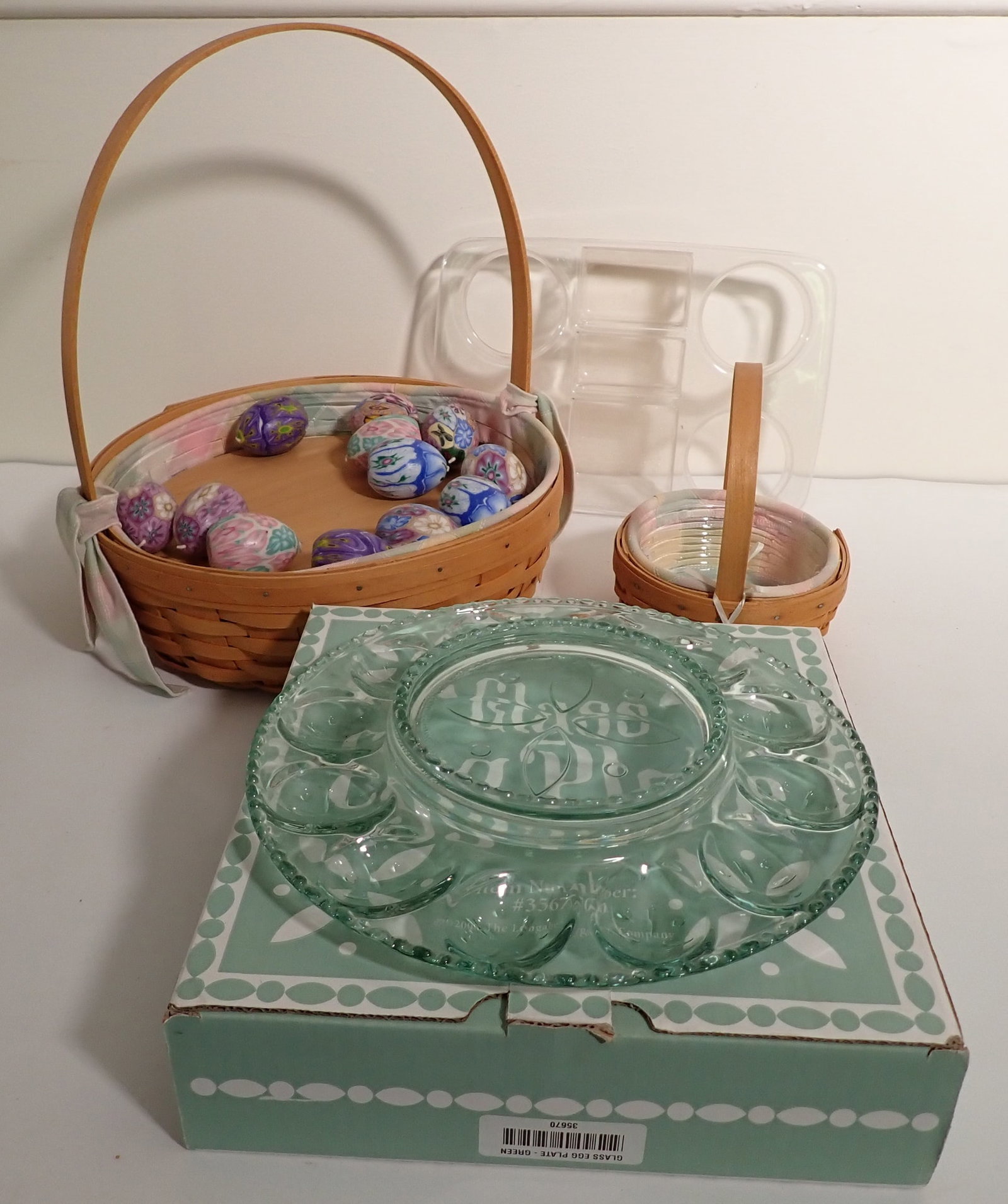 Longaberger Baskets Egg Plate & Insert: Largest basket is approx 12 1/2" in diameter and 14 1/2" to top of handle. Egg candles also included.