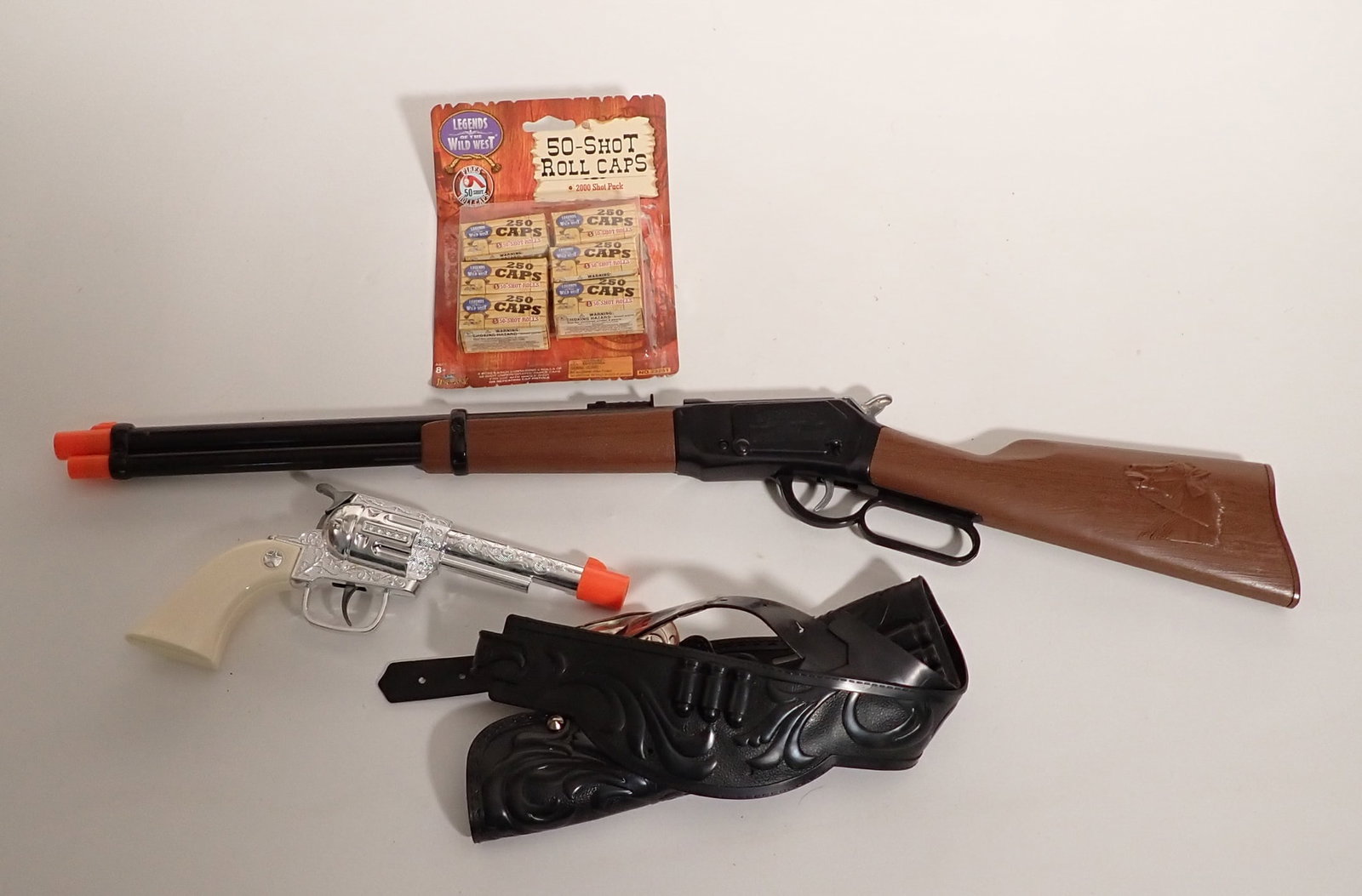 Vintage Toy Guns: Box of caps missing out of the pack. Longest gun is approx 26 3/4"
