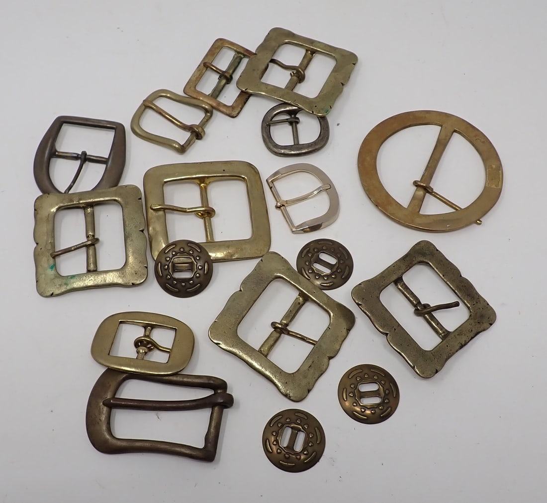 Brass Belt Buckles: Largest is approx 4" in diameter.