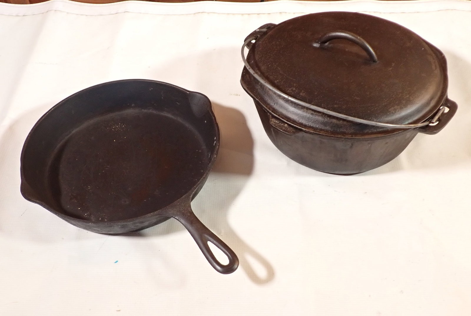 Cast Iron Skillet & Dutch Oven: Skillet is approx 10 1/2" in diameter