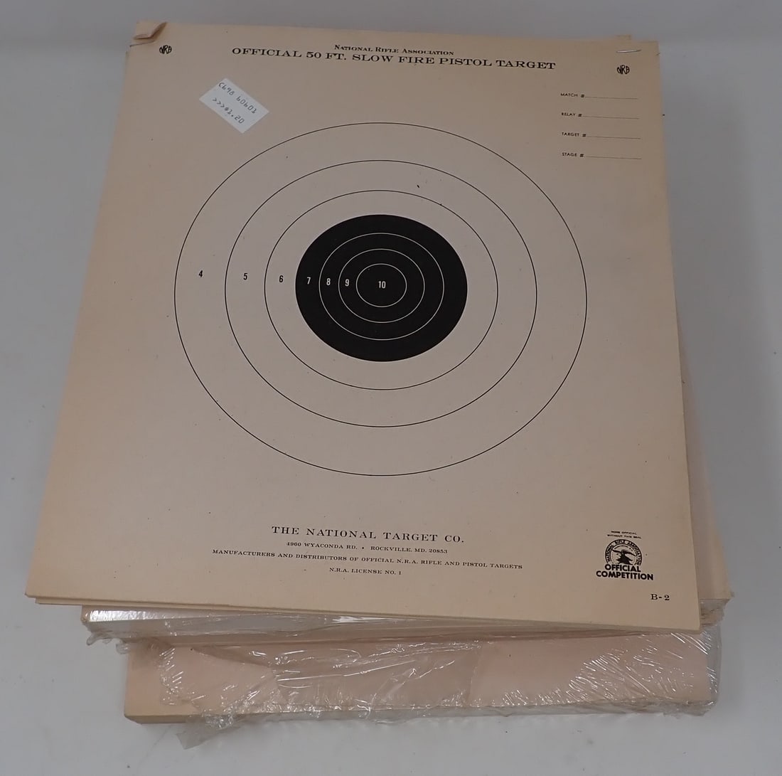 Stack of Gun Targets: Apprx 10 1/2" x 12". Stack is apprx 4 1/2" tall. Around 300 targets