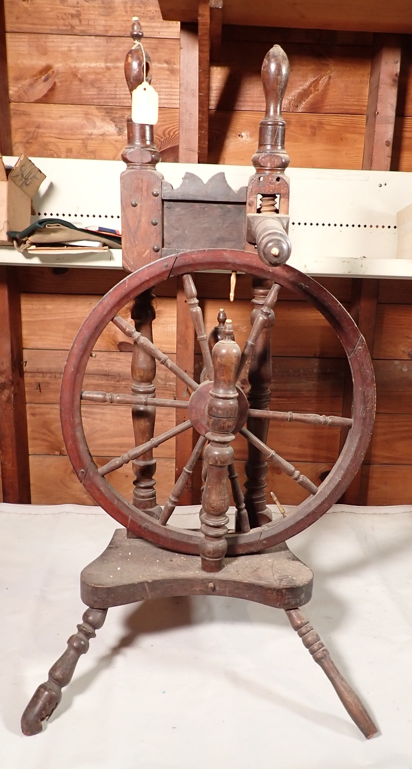Antique Spinning Wheel: Approx 33" tall. Wheel is 16 1/2" in diameter