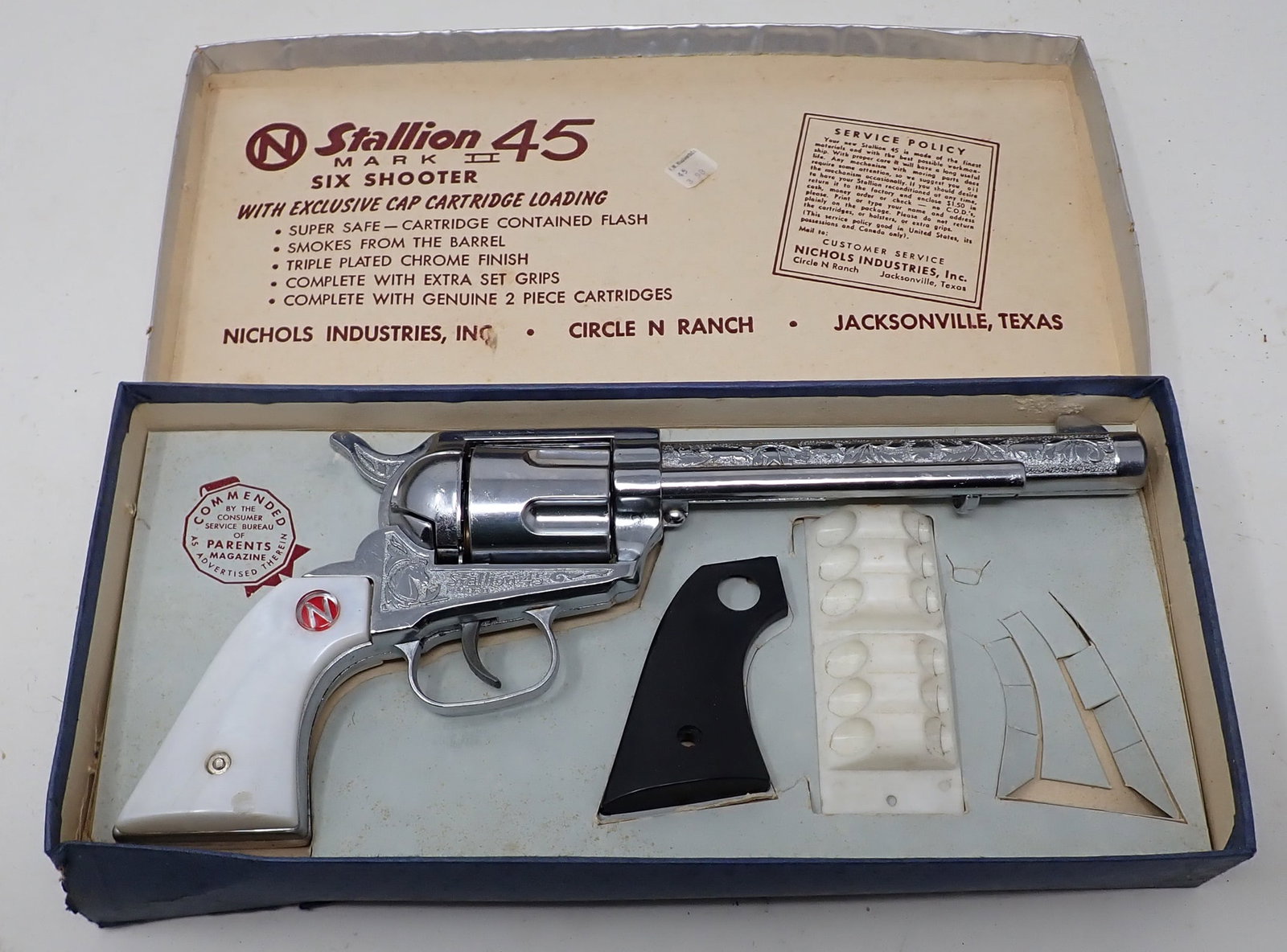 Nichols Ranch Stallion 45 Cap Gun Mark II Six Shooter: Missing one black grip.