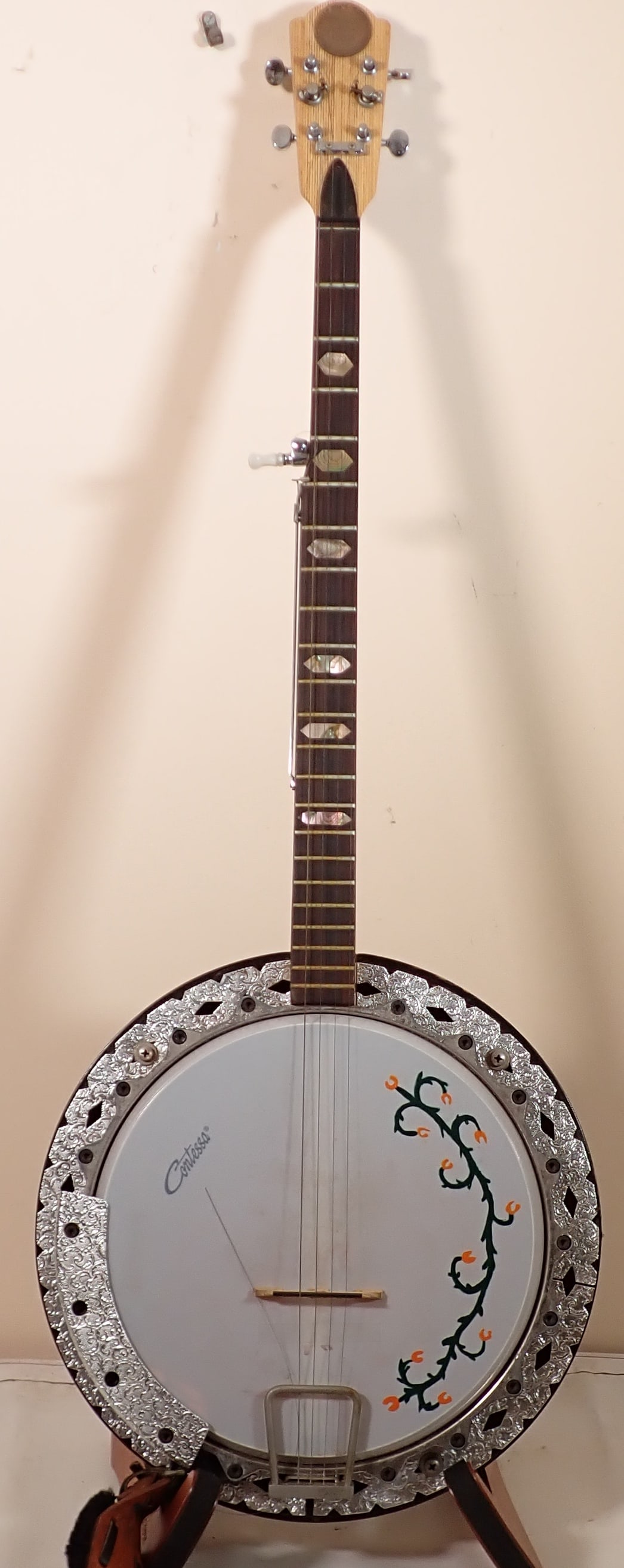 Contessa Banjo: Apprx 14" x 39 1/4". If shipping is needed , it would be packed and shipped thru The UPS Store. It is recommended to contact them for a shipping price. Their email is store5528@theupsstore.com . We wi