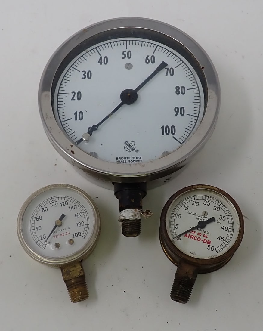 3 Gauges: Largest is approx 5 1/8" in diameter