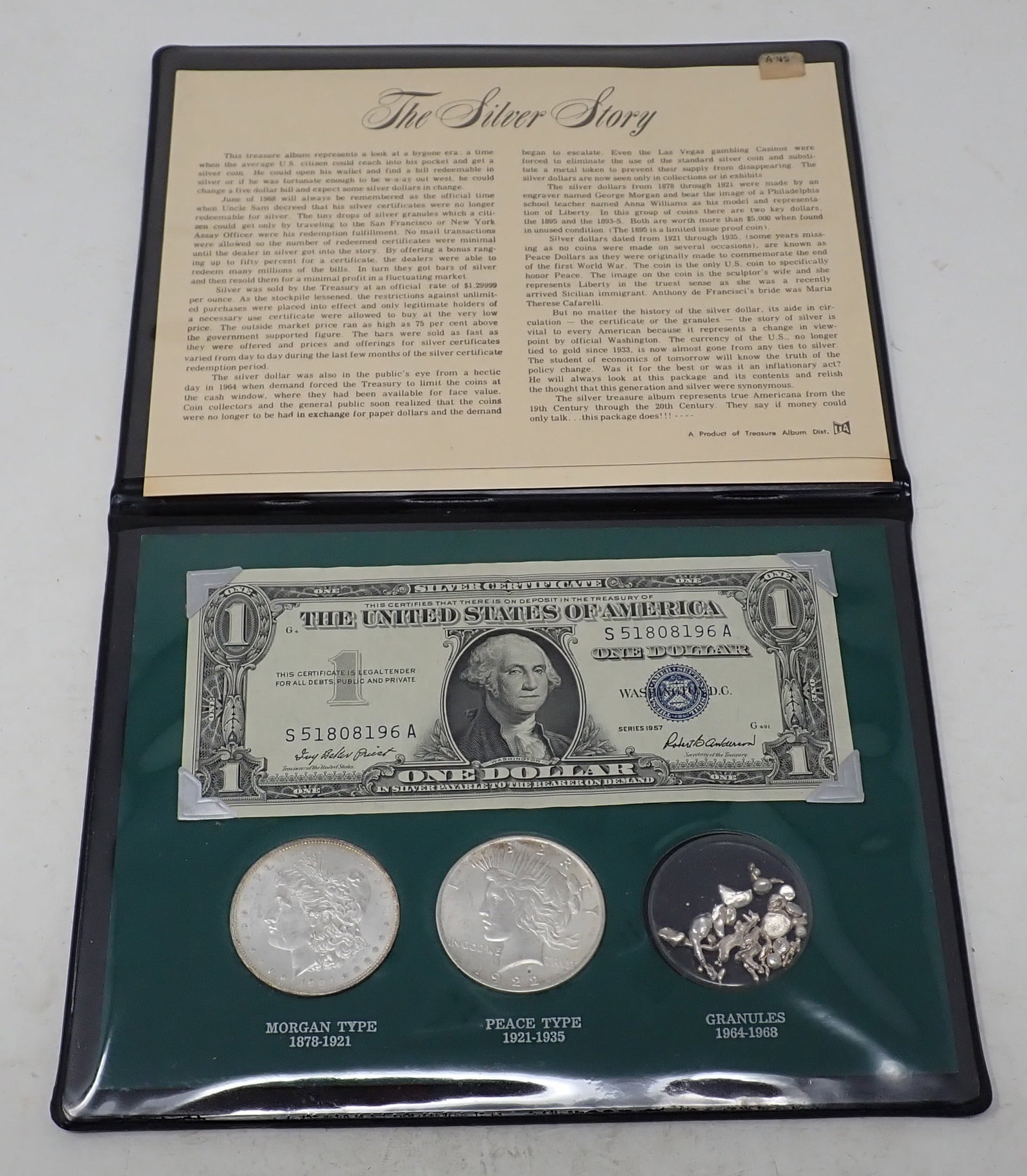 Silver Story Dollar Set: 1957 Silver Certificate, 1904 Morgan Silver Dollar, 1922 Peace Silver Dollar , and granules