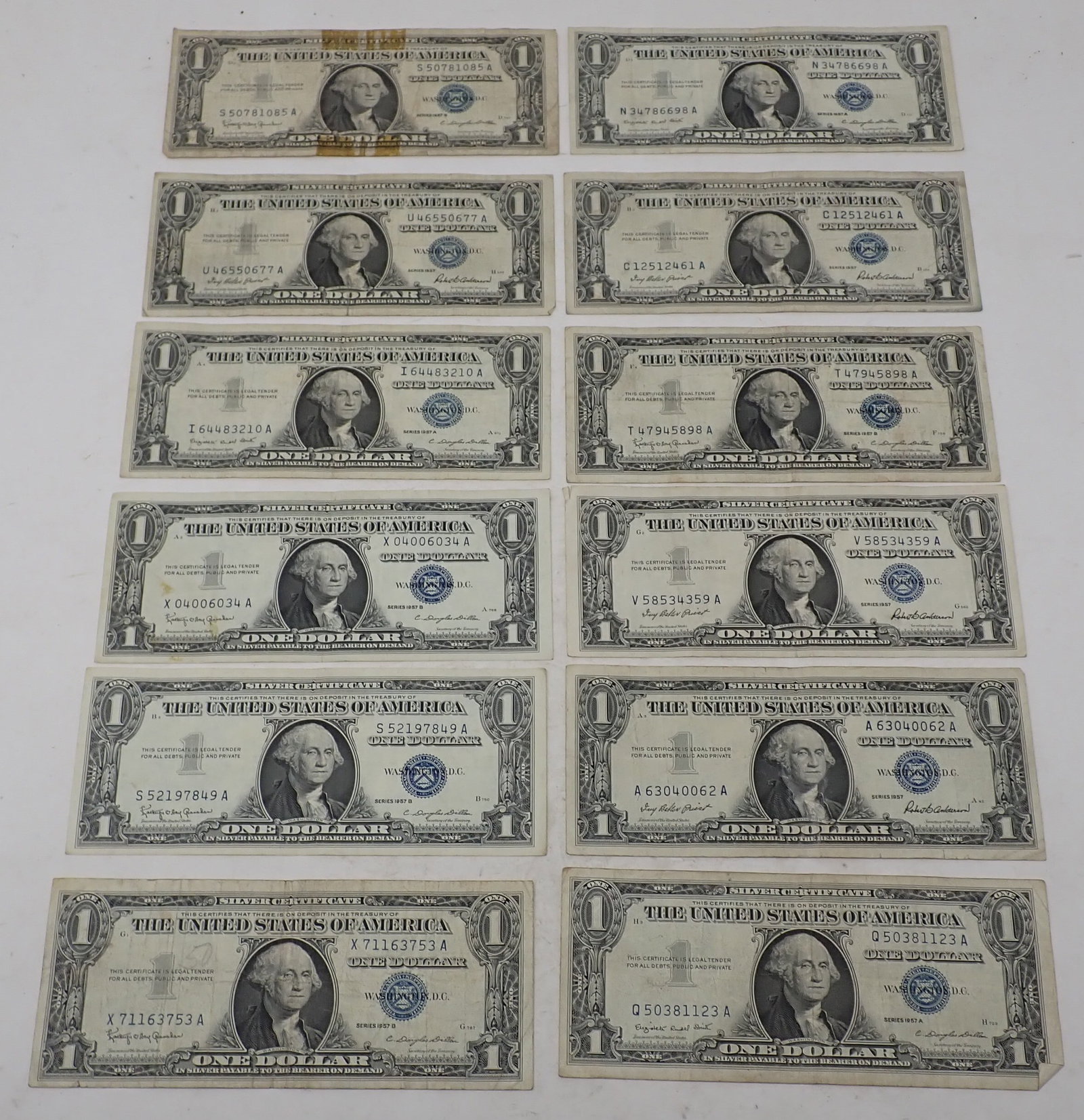 1957 $1 Silver Certificates: 12 One dollar silver certificates