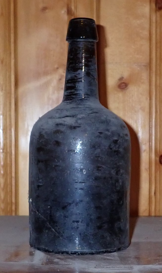 Bottle: Approx 4 1/4" in diameter and 9 3/4" tall.