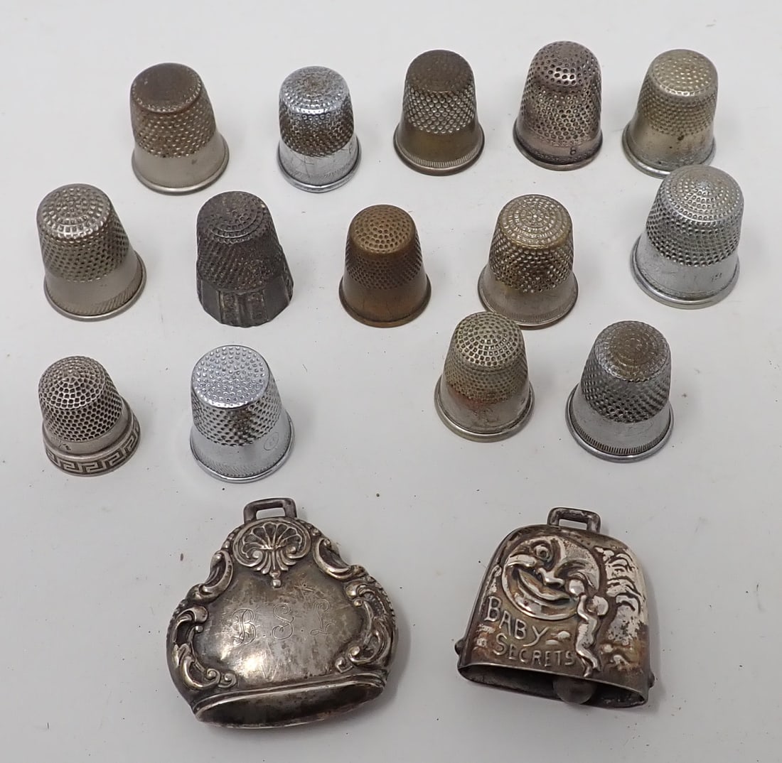 Thimbles Sterling Silver Baby Rattle & Bell: Bell is apprx 1 1/8" x 1 3/16". Rattle, Bell, and one thimble are marked Sterling.