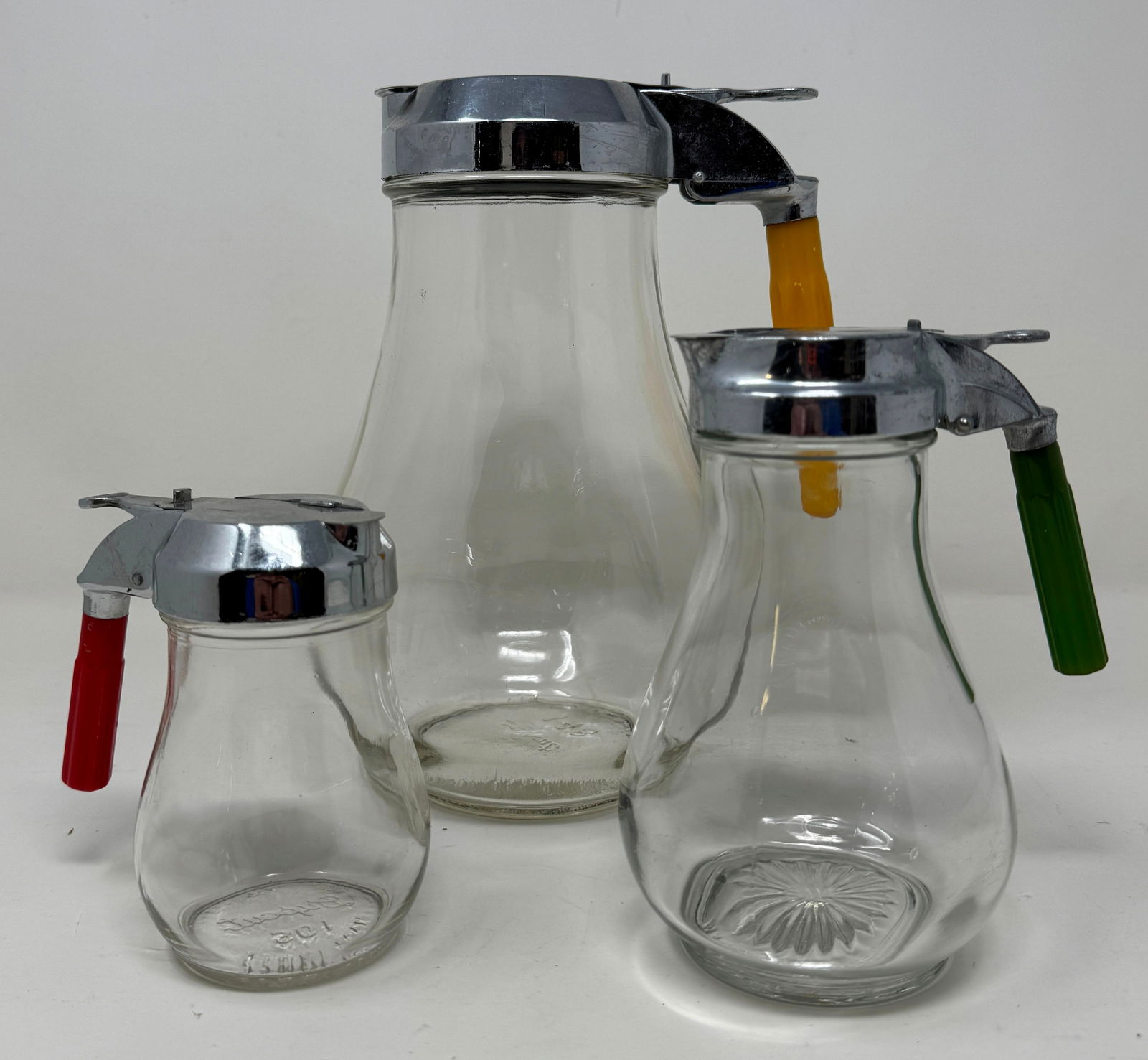 Syrups w/ Bakelite Handles: Tallest is apprx 8 1/2"