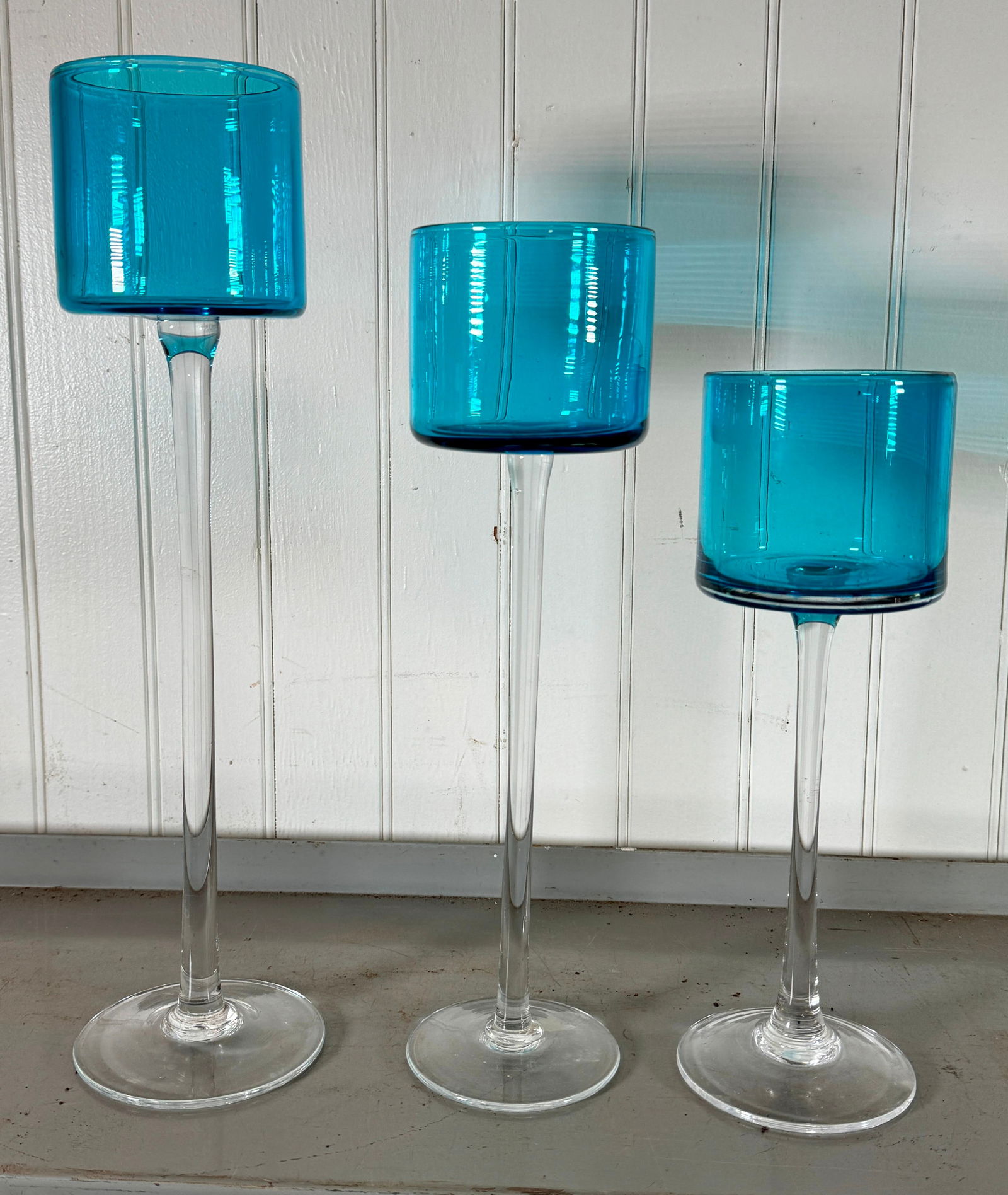 Blue Glass Goblets: Tallest is approx 3 1/2" in diameter and 15" tall. No shipping