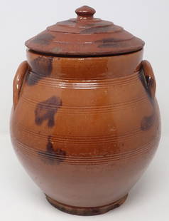 Redware Cookie Jar / Canister: Approx 9" in diameter and 9 3/4" tall. If shipping is needed it would be packed and shipped thru UPS Store 5528. Please get a shipping quote before bidding