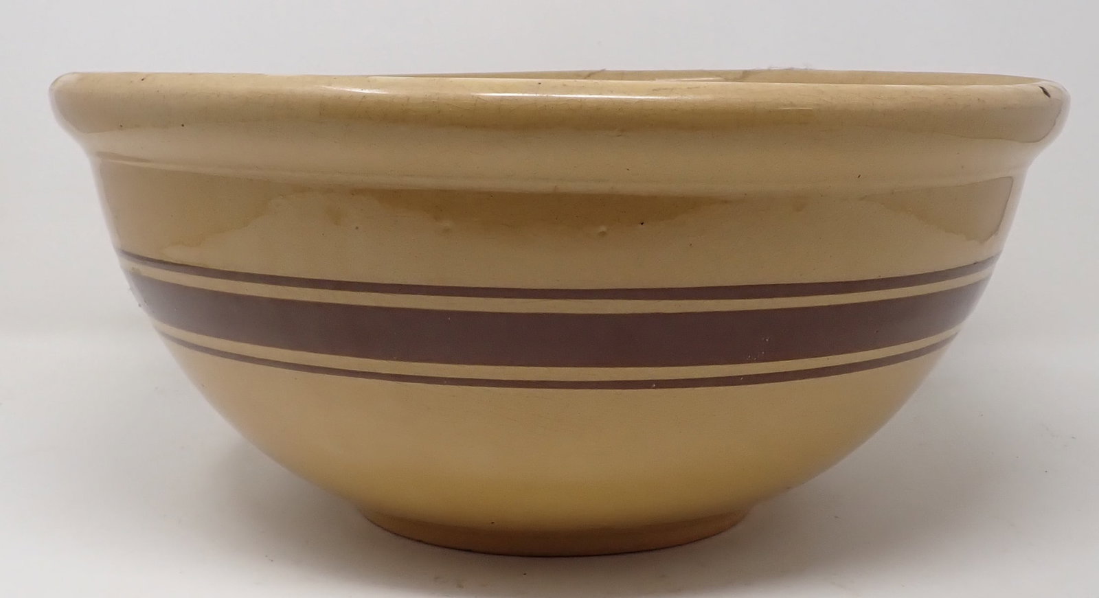 Yellow Ware Mixing Bowl: Approx 13 5/8" in diameter and 6 1/4" tall.