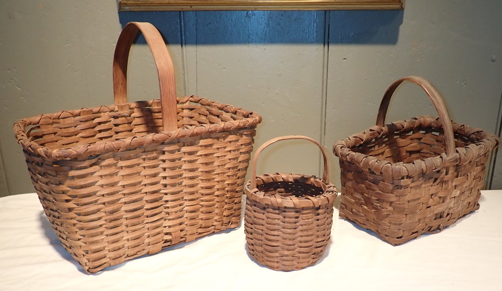 3 Baskets: Largest is apprx 8 1/2" x 13" x 13" tall