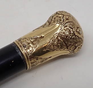 1857 New Years Walking Stick w/ Gold Head: Approx 1/2" in diameter at base, 1 3/8" in diameter at head, 35 3/4" long. This is not marked gold, or guaranteed gold. This is a Heavy cane / walkig stick. Head is heavy also !