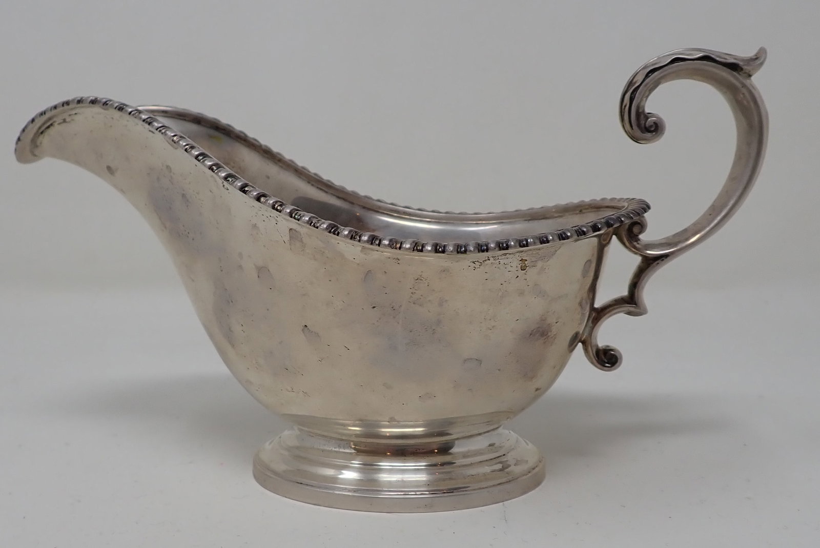 Gorham No. 259 Sterling Silver Gravy: Approx 4" x 7 5/8" x 4 1/2" tall. Weighs approx 255 grams